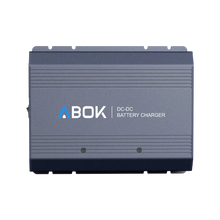 ABOK ACS500 DC-DC battery charger in a straight product view showing its ribbed aluminum housing and ABOK branding.